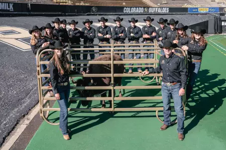 Ralphie and her team of Handlers stand in Folsom