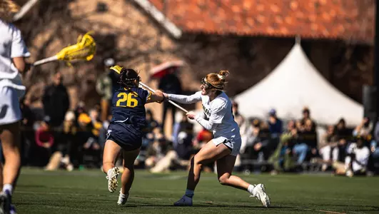 Liz defends against a Cal attacker