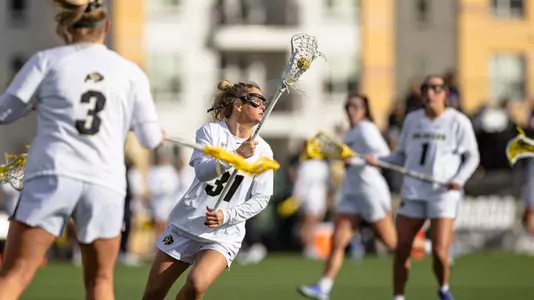 Zoe McElhaney looks to make a pass