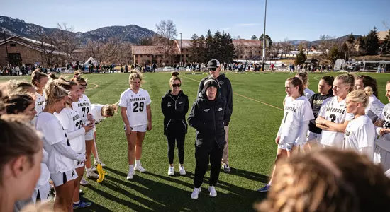 Ann Elliott Whidden talks to the team