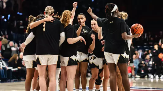 CU huddles at Arizona