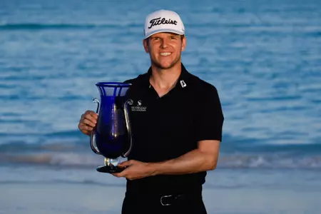 GREAT EXUMA ISLAND, BAHAMAS - JANUARY 17: Jeremy Paul of Germany poses with the trophy after winning The Bahamas Great Exuma Classic at Sandals Emerald Bay Golf Club on January 17, 2024 in Great Exuma Island, The Bahamas. (Photo by Mike Mulholland/Getty Images)