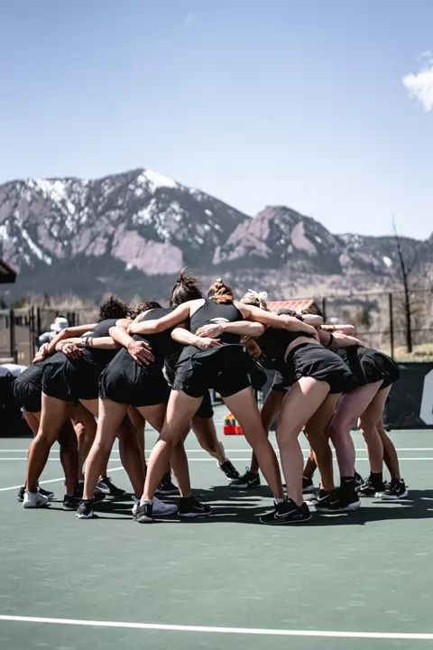 Tennis Team Huddle