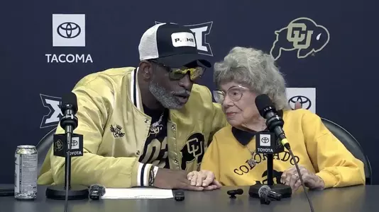 Coach Prime and Miss Peggy