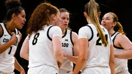 CU huddles vs Denver