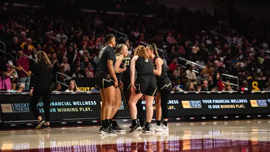 Team huddle at USC