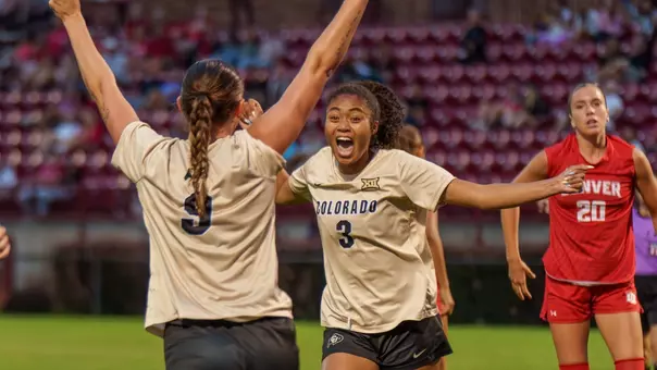 Jace Holley and Emerson Layne celebrate vs Denver