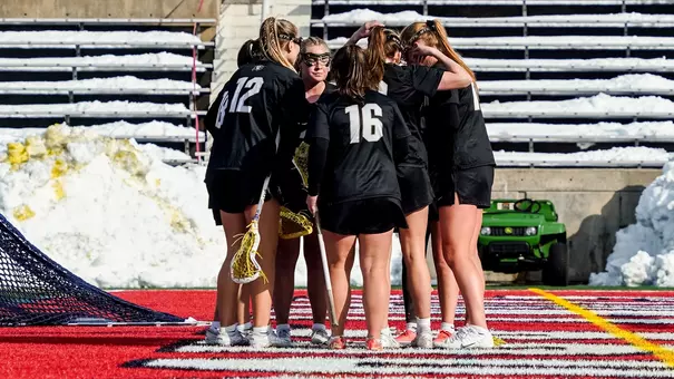 Team huddle at Stony Brook