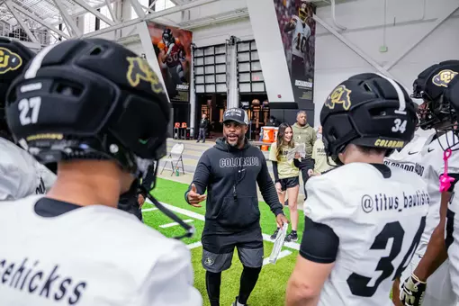 Coach J Mac talking to RB room