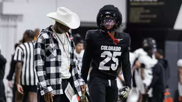 Mojo Williams and Coach Prime