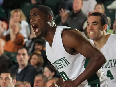 Men Focus on the Floor Following Finals