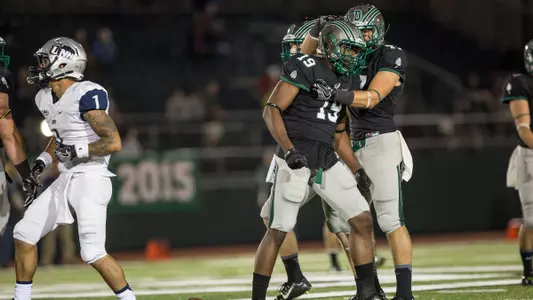 Big Green Spoil Holy Cross Homecoming in 35-10 Win