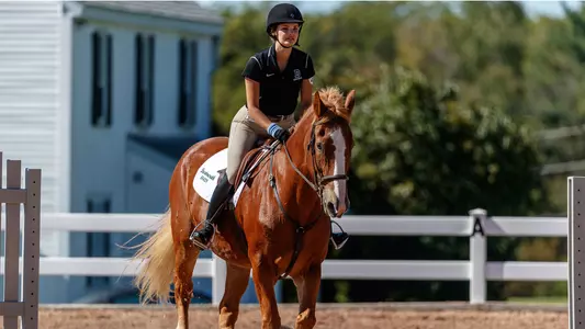 Lyza Begunova riding a horse at dartmouth invite