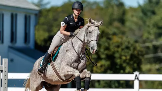 Meghan Poth riding a horse at Morton Farm