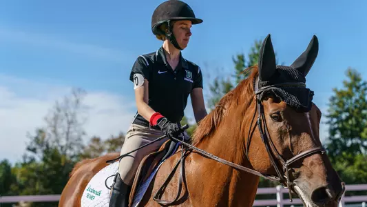 Sophie Lenihan riding a horse at morton farm