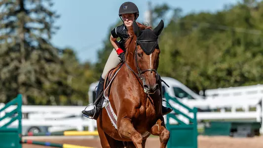 Sophie Lenihan riding a horse at morton farm