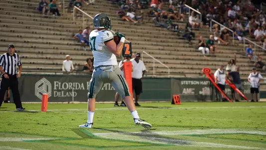 Cam Poole catches a 5-yard pass for a touchdown at Stetson on Sept. 16, 2017.