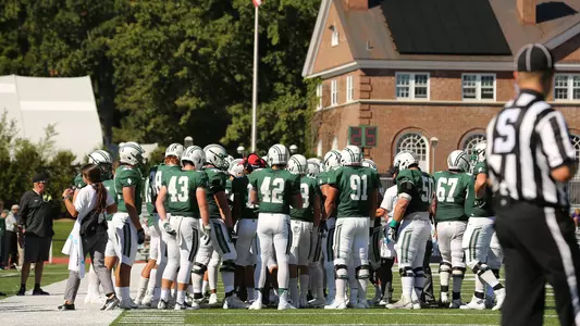 Team huddling during Georgetown game on Sept. 15, 2018