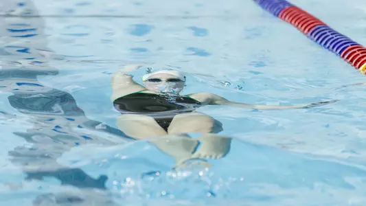Susannah Laster women's swim action versus Yale and Penn