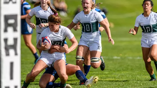 Abigail Schill rugby action against Quinnipiac