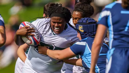 Carlicia Beam rugby action against Quinnipiac