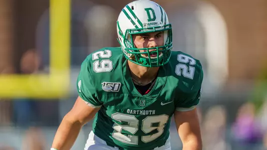 Landon McDermott football action against Yale