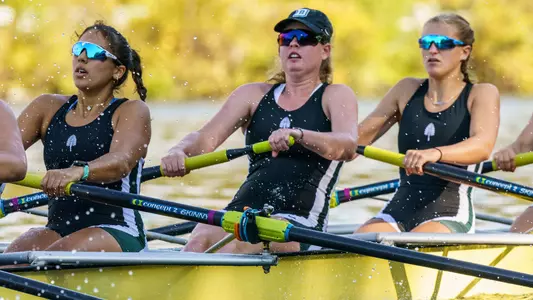 Ellie Urdang, Caitlin Lynch and Audrey Adamchak rowing at Gardner Cup