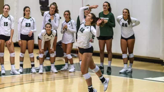 Freshman Grace Wiczek serving the ball