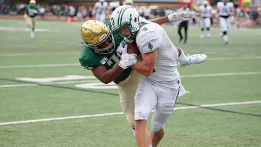 Drew Estrada fights off a Jacksonville defender in the end zone for a touchdown, Sept. 21, 2019
