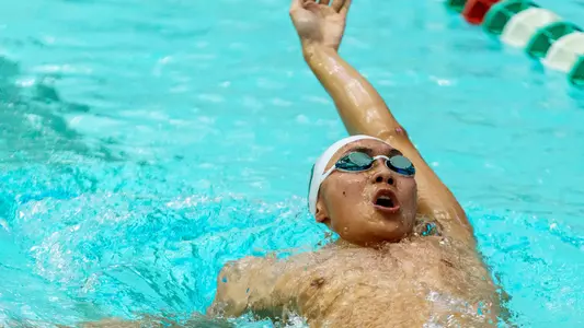 Alec Kong men's swimming and diving versus Bates