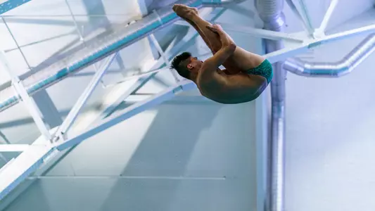 Jonathan Hu men's swimming and diving versus Bates