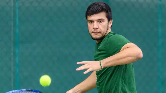 Alejandro Quiles men's Tennis action versus Navy