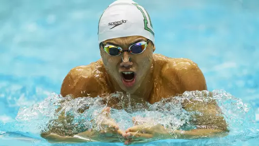 Dylan Chan swimming against Bates