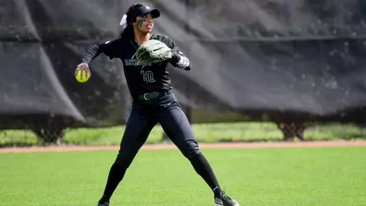 Morgan Ebow softball action versus Virginia Tech