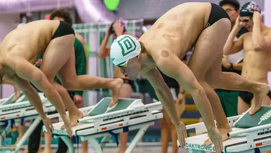 Noah Hensley men's swimming action at Ramsden Invite