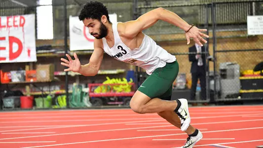 Myles Holt men's track day one action at Heps