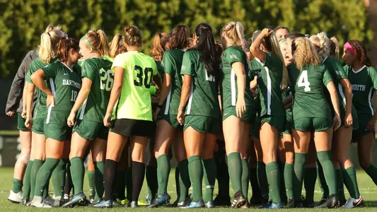 women's Soccer huddle versus UNH