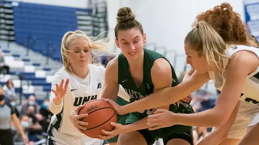 Dartmouth forward Isabella DiGiovanni (33) holds onto the ball during the game between Dartmouth and UNH at Lundholm Gymnasium, Durham, New Hampshire, USA on November 13, 2021. Photo Credit: Chris Poss
