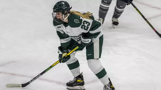 Kate McDermott women's hockey action versus Saint Anselm