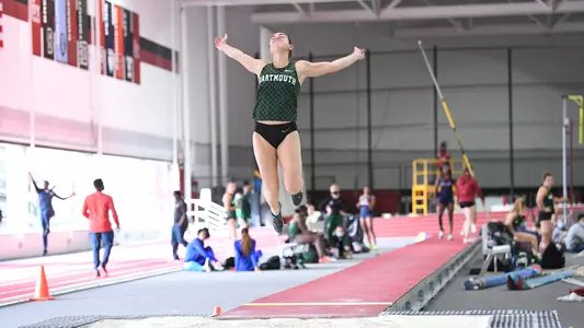 Anoush Krafian jumping at Harvard track meet