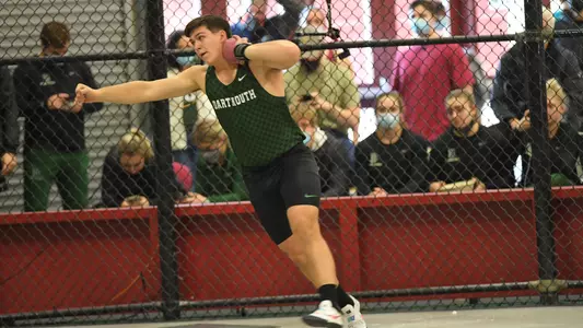 Ben Pable throwing at Harvard track meet