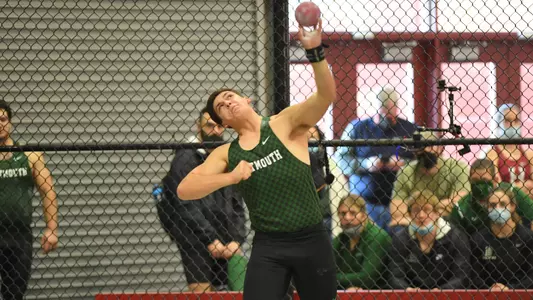 Ben Pable throwing at Harvard track meet