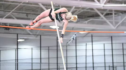 Chloe Taylor jumping at Harvard track meet
