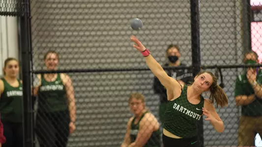 Julia Reglewski throwing at Harvard track meet