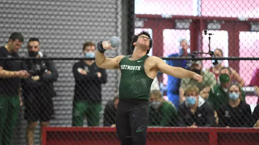Michael Gabriel throwing at Harvard track meet