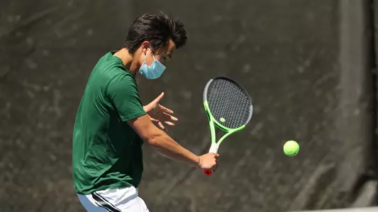 Logan Chang men's tennis action versus Williams
