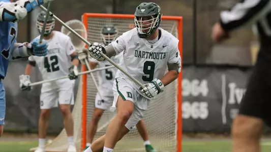 Blake Brookes men's lacrosse action versus Tufts