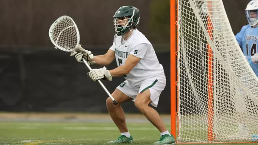 Hunter Binney men's lacrosse action versus Tufts