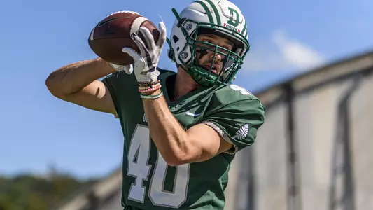 RJ Brandon football action versus Sacred Heart