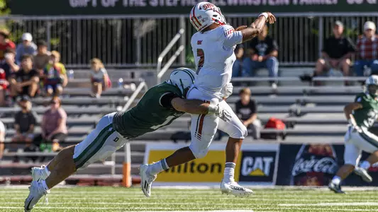 Seth Walter football action versus Sacred Heart